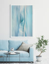 blue toned abstract wall art photographic piece by Julie Sisco North Stradbroke Island elemental with a blue couch and indoor plant living room