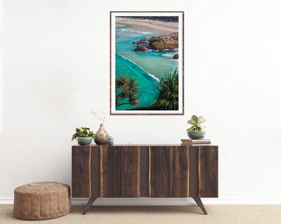 framed wall art photograph of South Gorge on North stradbroke Island on the wall above a buffet sideboard cupboard