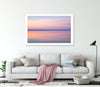 living room with framed wall art print of pastel pink abstract image of still calm waters at sunset on North Stradbroke Island