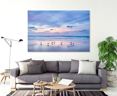 wall art of peaceful sunset image of seagulls on the beach at Stradbroke on the wall in a living room