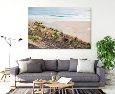 Wall art canvas print of pandanus trees growing on cliff face sloping towards the beach at Castaways lagoon on Home Beach on North Straddie Island